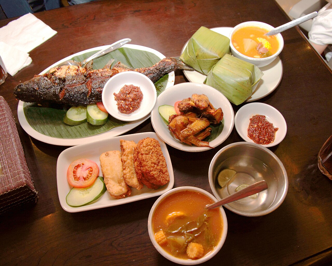 South Indian banana leaf rice meal served with vegetable curries and accompaniments in Malaysia