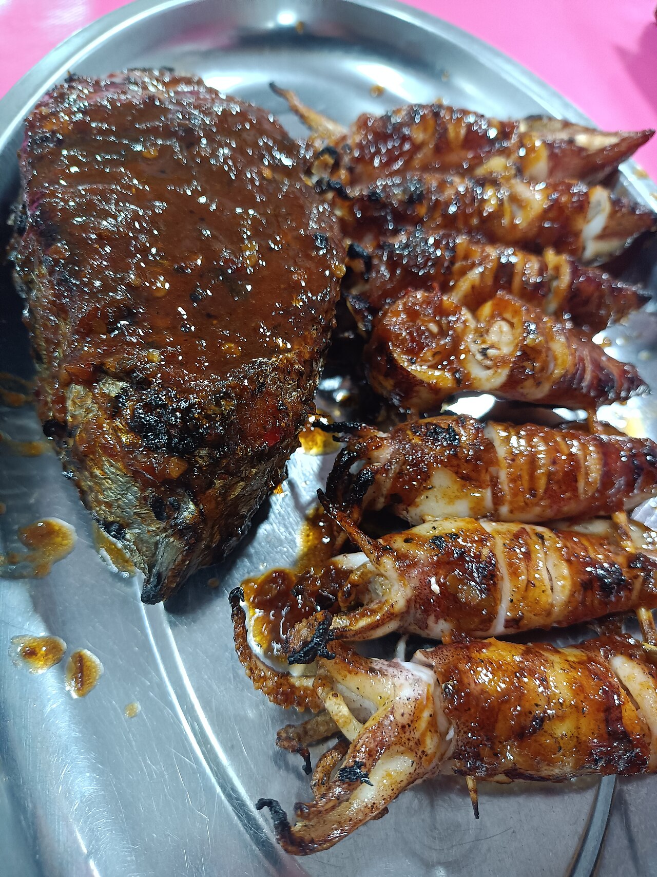 Grilled seafood stalls at Kota Kinabalu night market waterfront