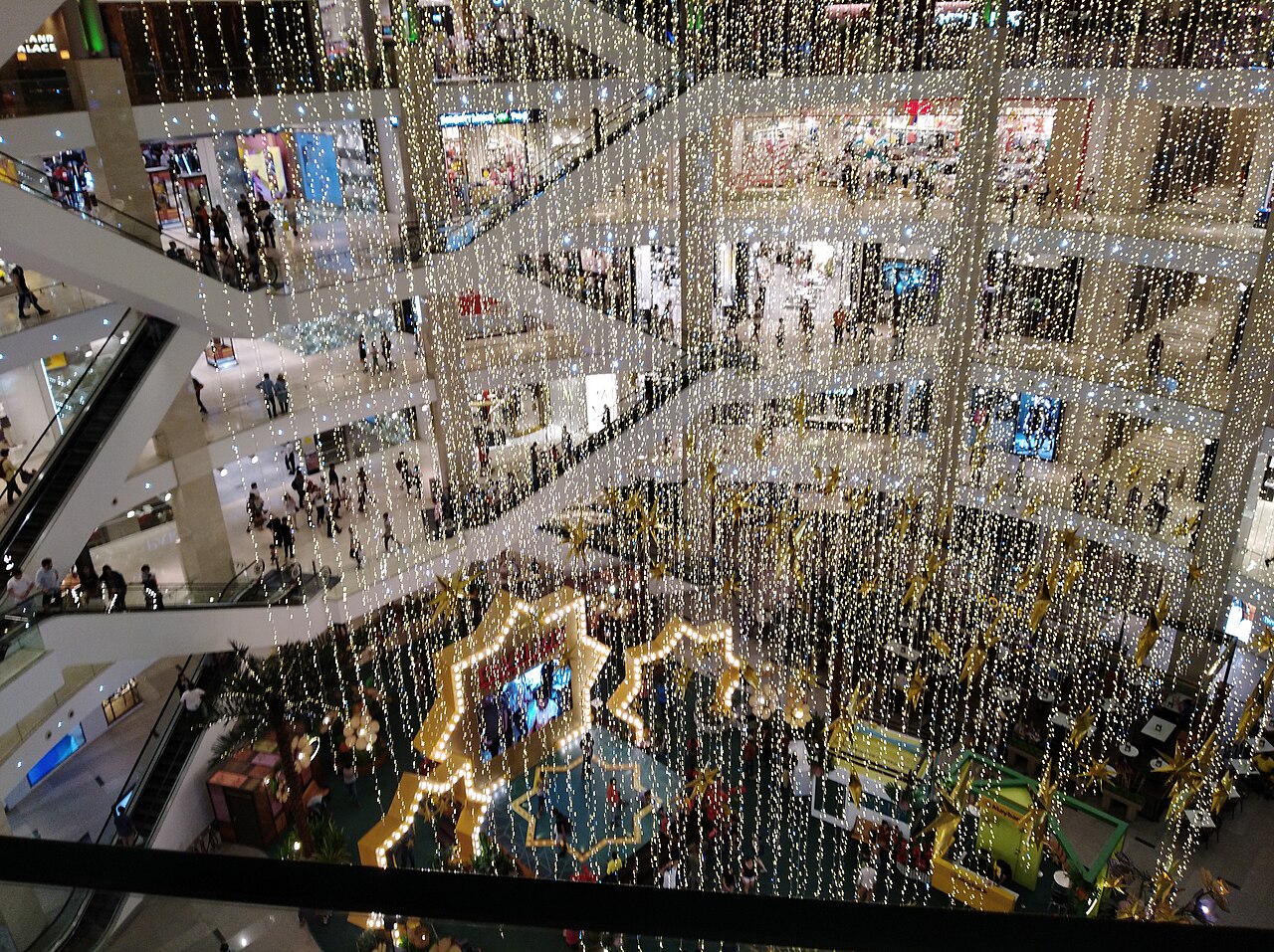 Luxury shopping mall interior in Pavilion Kuala Lumpur with multiple retail floors and skylights