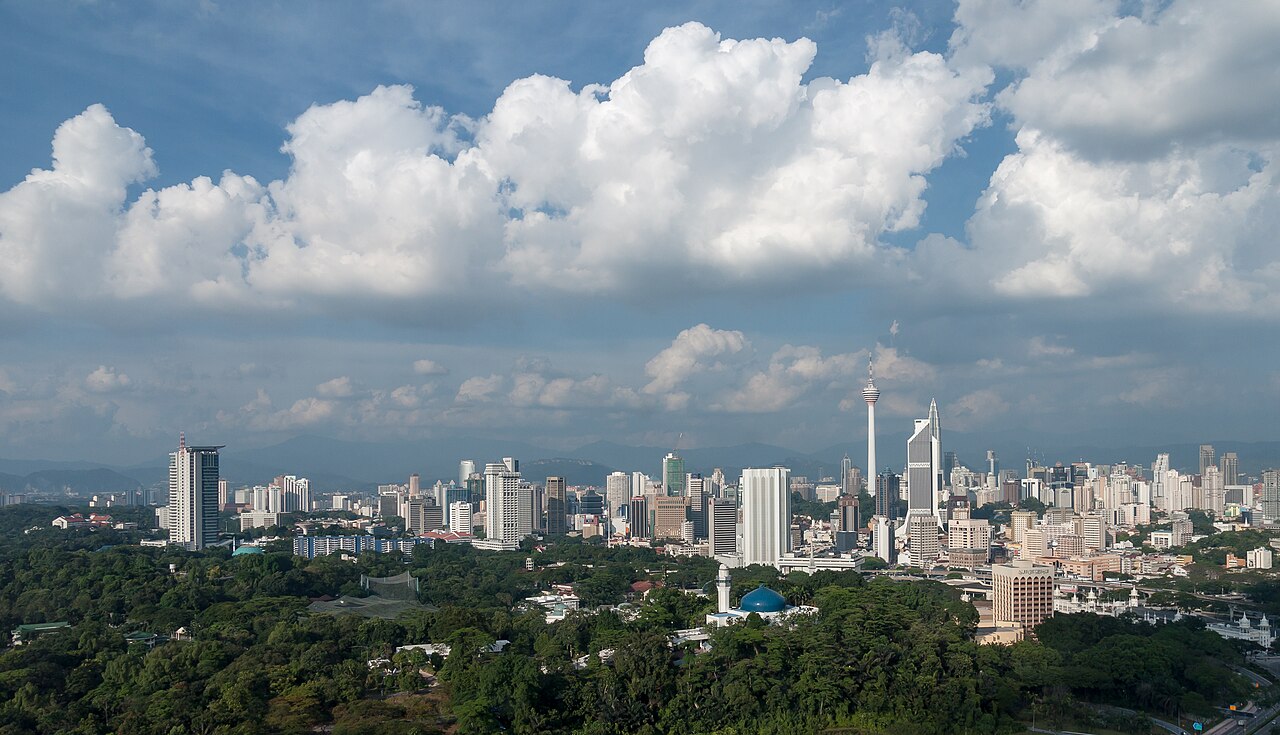 Kuala Lumpur skyline with the Petronas Twin Towers at dusk, Malaysia