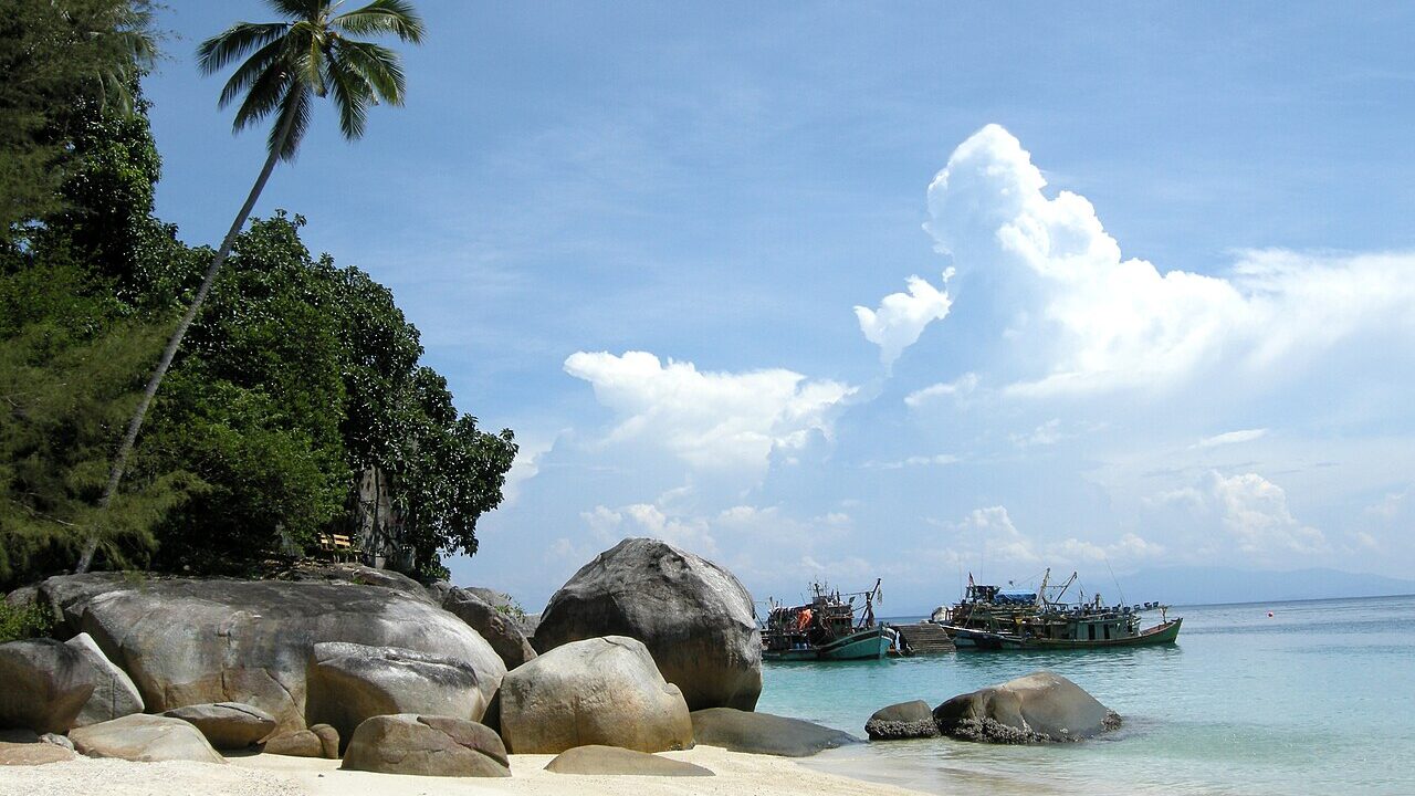 Tropical beach with clear turquoise water on Perhentian Besar, Malaysia