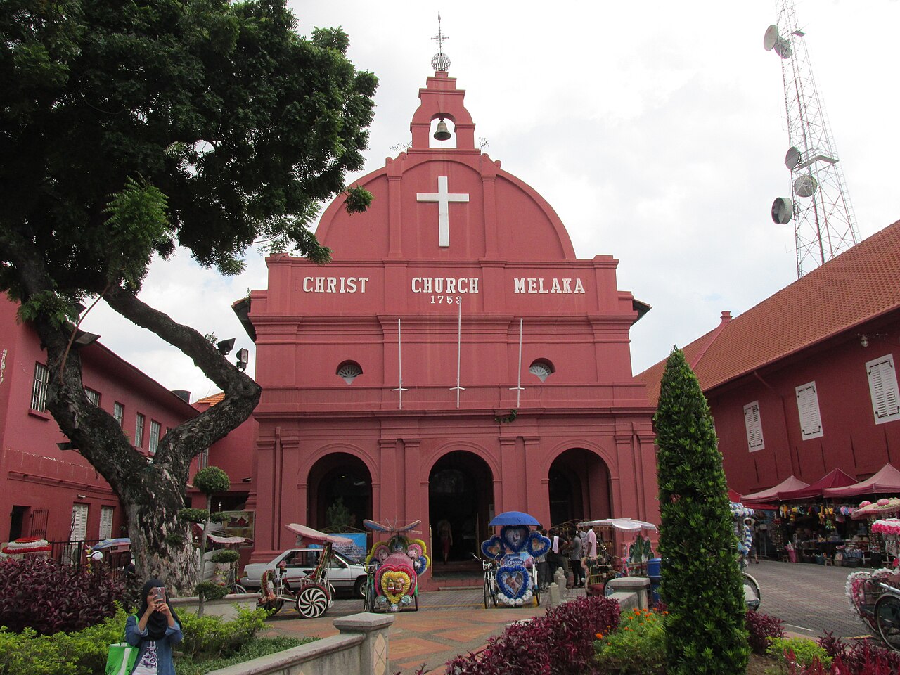Christ Church Melaka and decorated trishaws on Dutch Square