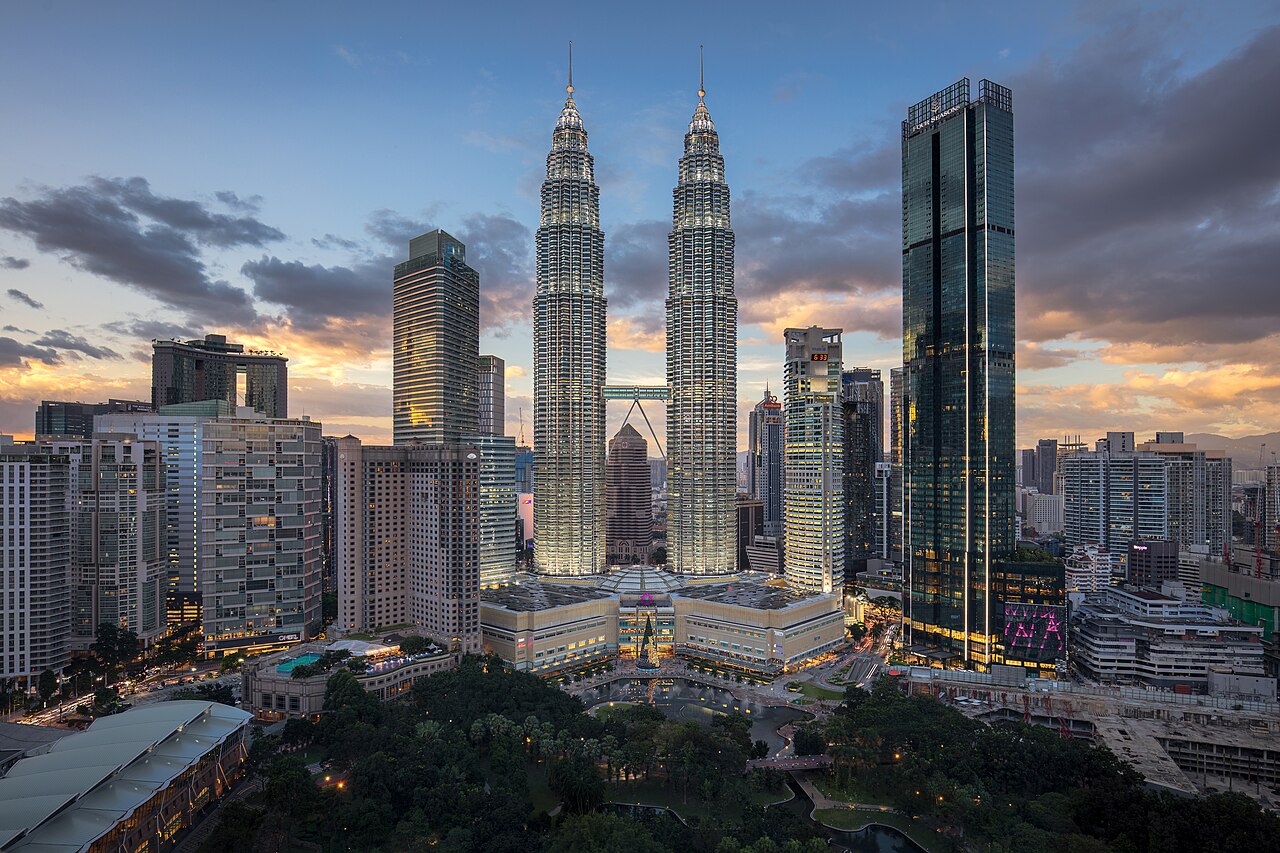 The Petronas Twin Towers and the KLCC skyline at dusk