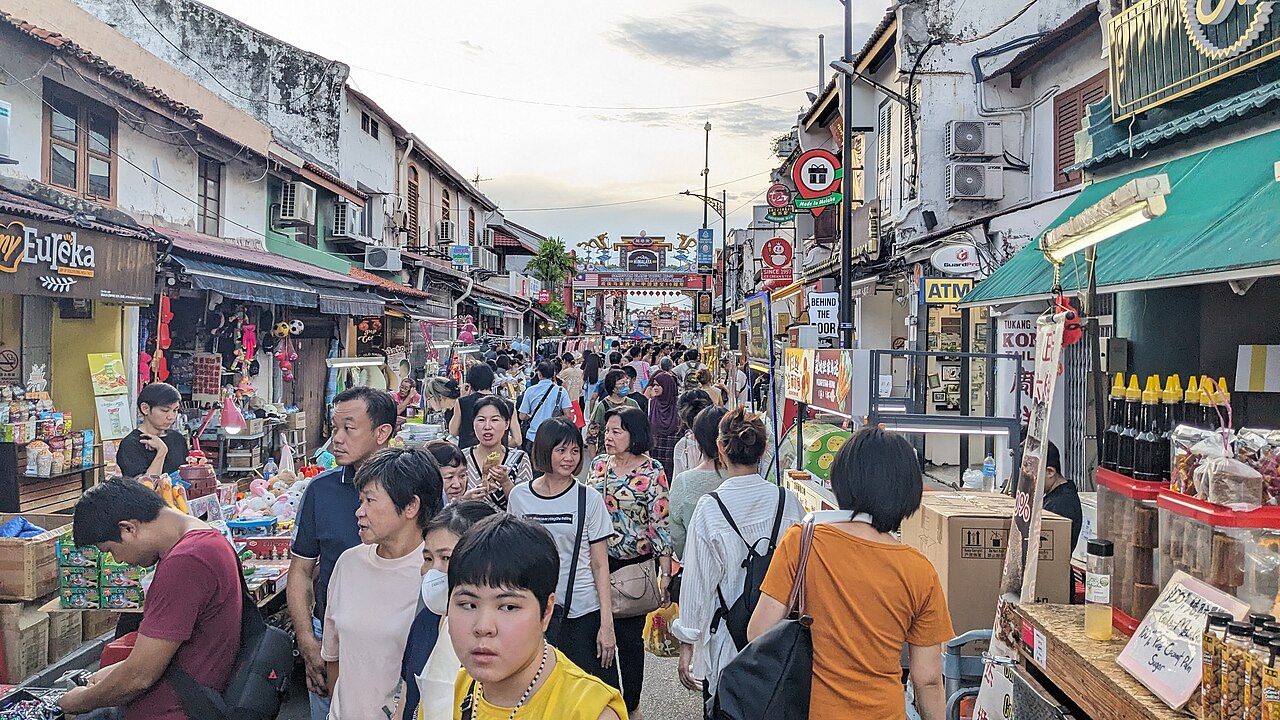 Crowds at the Jonker Street night market in Melaka at dusk