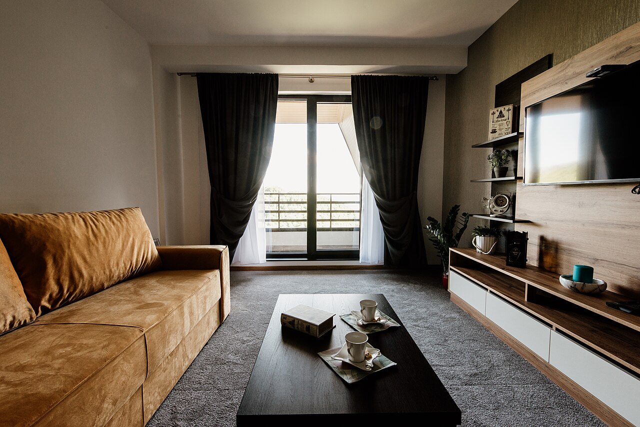 Modern furnished living room interior typical of a serviced apartment rental