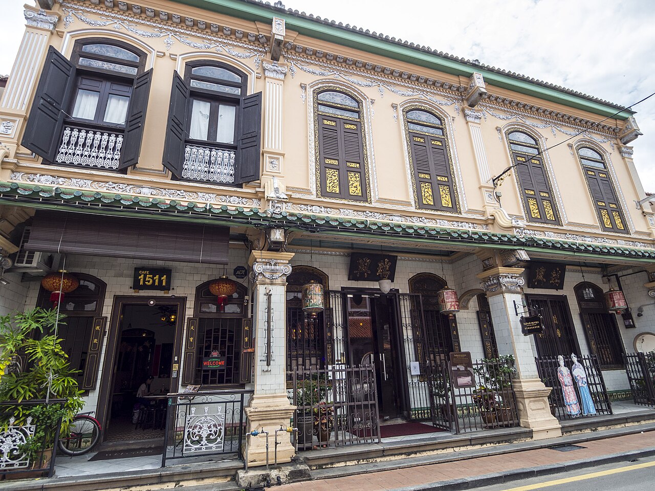 The shuttered shophouse frontage of the Baba and Nyonya Heritage Museum on Jalan Tun Tan Cheng Lock