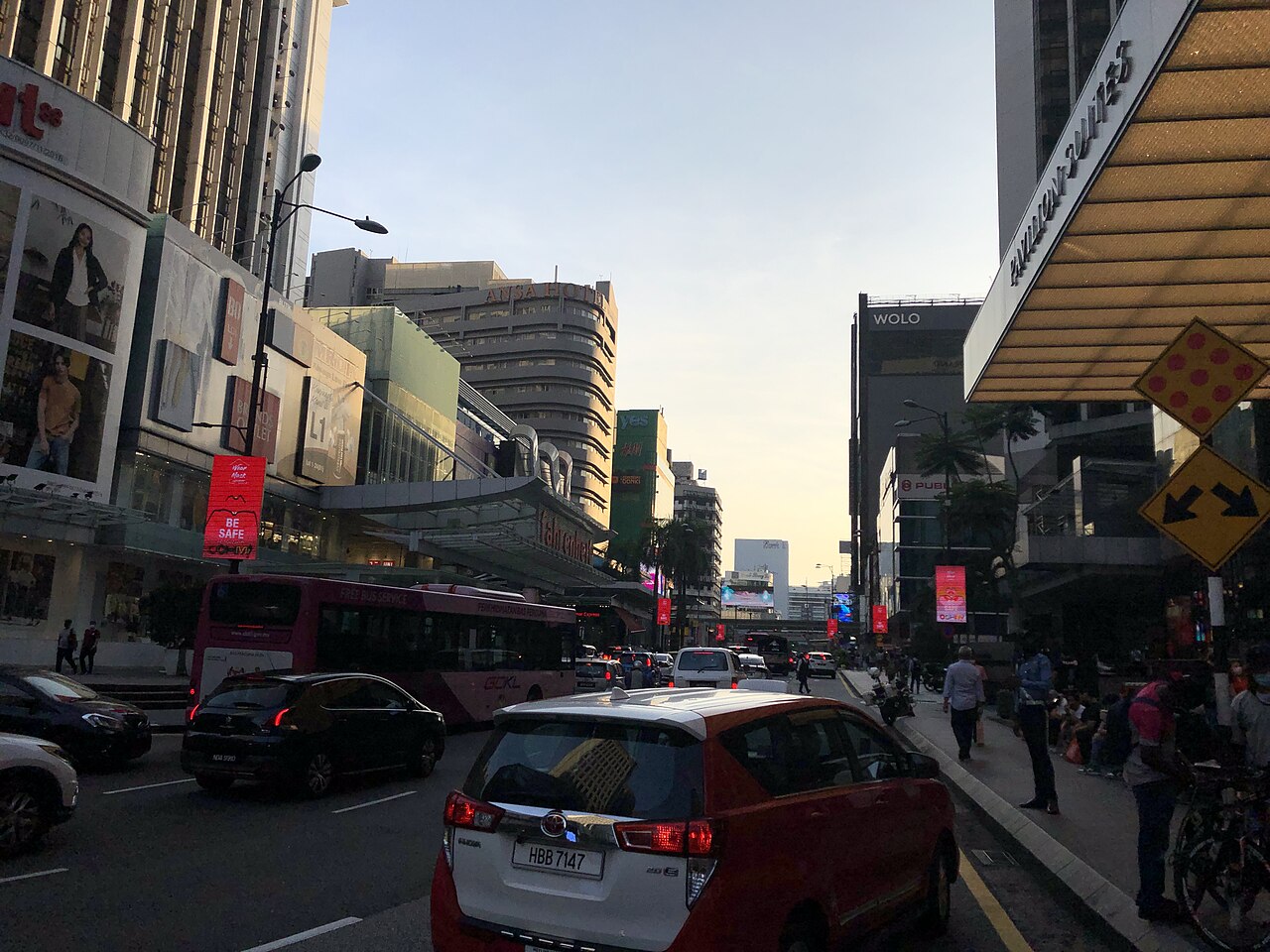 Traffic, shopfronts and pedestrians along Jalan Bukit Bintang in Kuala Lumpur